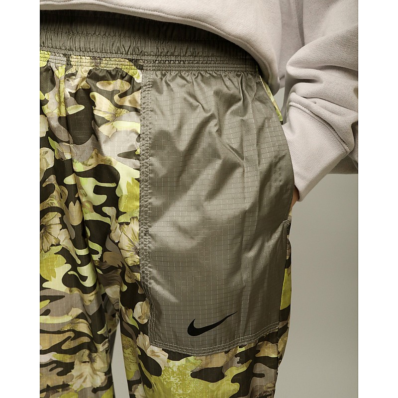 Брюки Nike W NSW WVN AOP MR JGGR P&G Жіноча р.XS