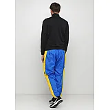 Брюки Nike M NSW RE-ISSUE PANT WVN Чоловіки р.2XL Жовтий/Синій