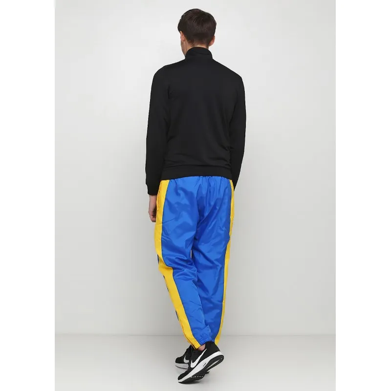 Брюки Nike M NSW RE-ISSUE PANT WVN Чоловіки р.2XL Жовтий/Синій