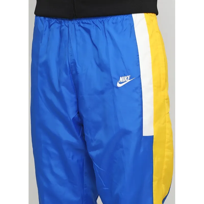 Брюки Nike M NSW RE-ISSUE PANT WVN Чоловіки р.2XL Жовтий/Синій