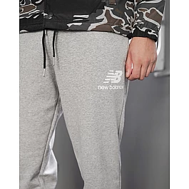 Брюки New Balance NB ESSENTIALS STACKED LOGO Чоловіки р.S