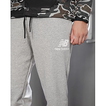 Брюки New Balance NB ESSENTIALS STACKED LOGO Чоловіки р.S