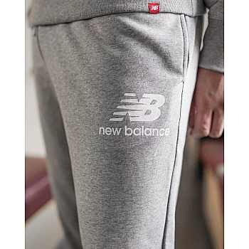 Брюки New Balance NB ESSENTIALS STACKED LOGO Чоловіки р.S