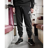Брюки New Balance NB Ess Stacked Logo Чоловіки р.S
