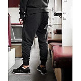 Брюки New Balance NB Ess Stacked Logo Чоловіки р.S