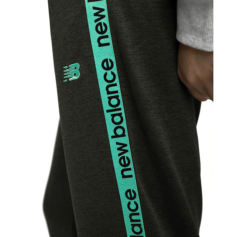 Брюки New Balance Relentless Jogger Жіноча р.XS Зелений/Чорний