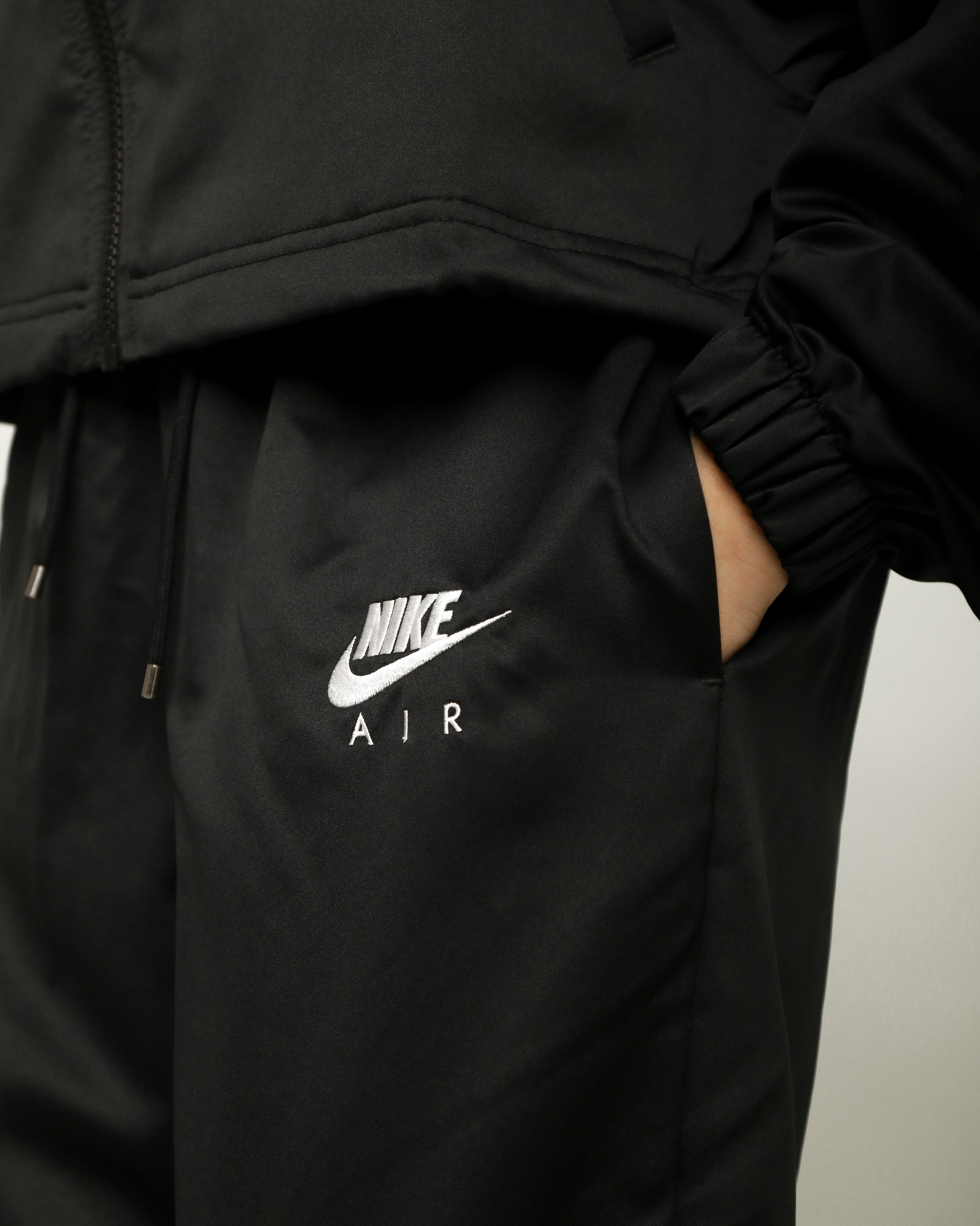 Брюки Nike W NSW AIR WVN MR PNT Жіноча р.XS