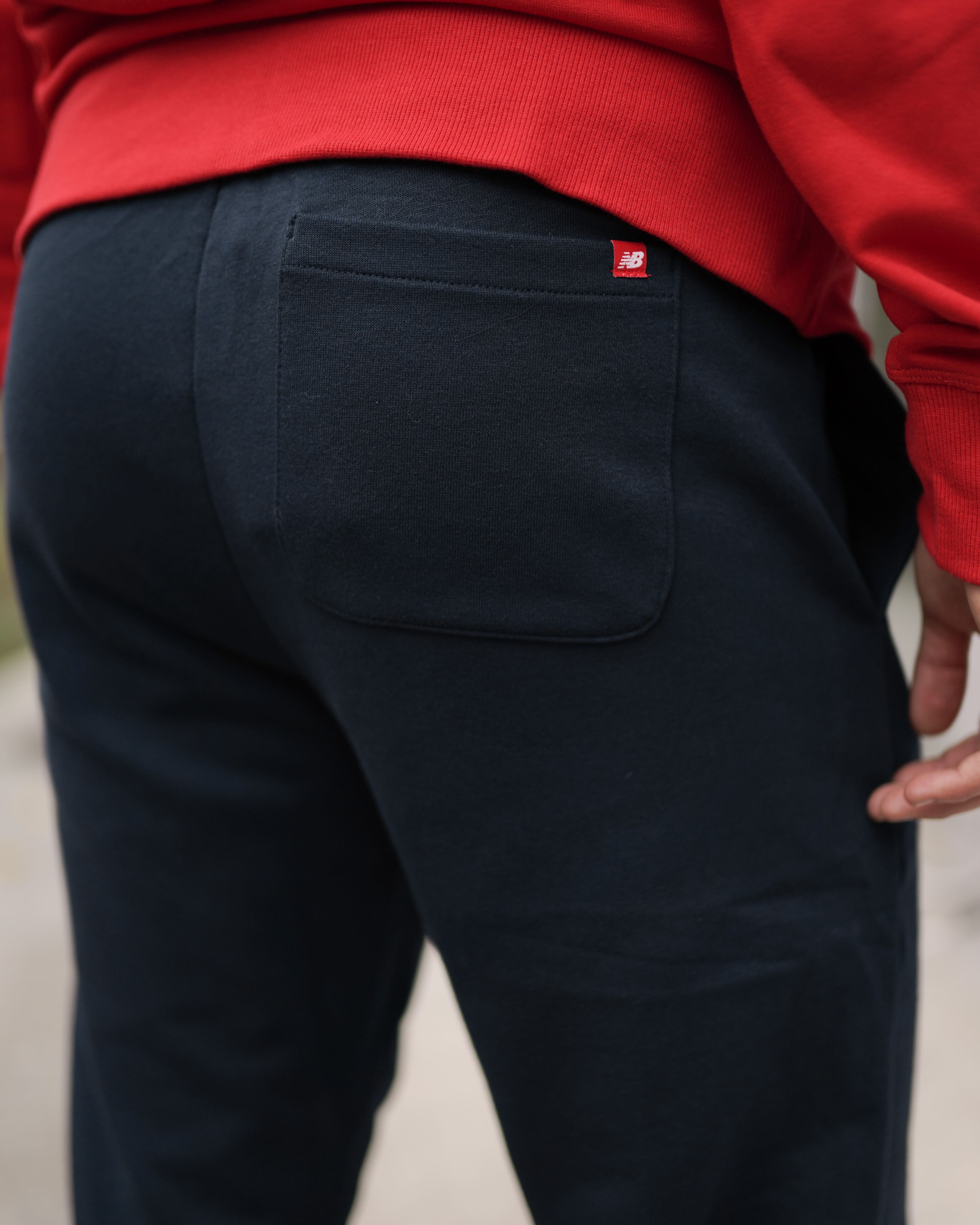 Брюки New Balance NB Ess Stacked Logo Чоловіки р.M