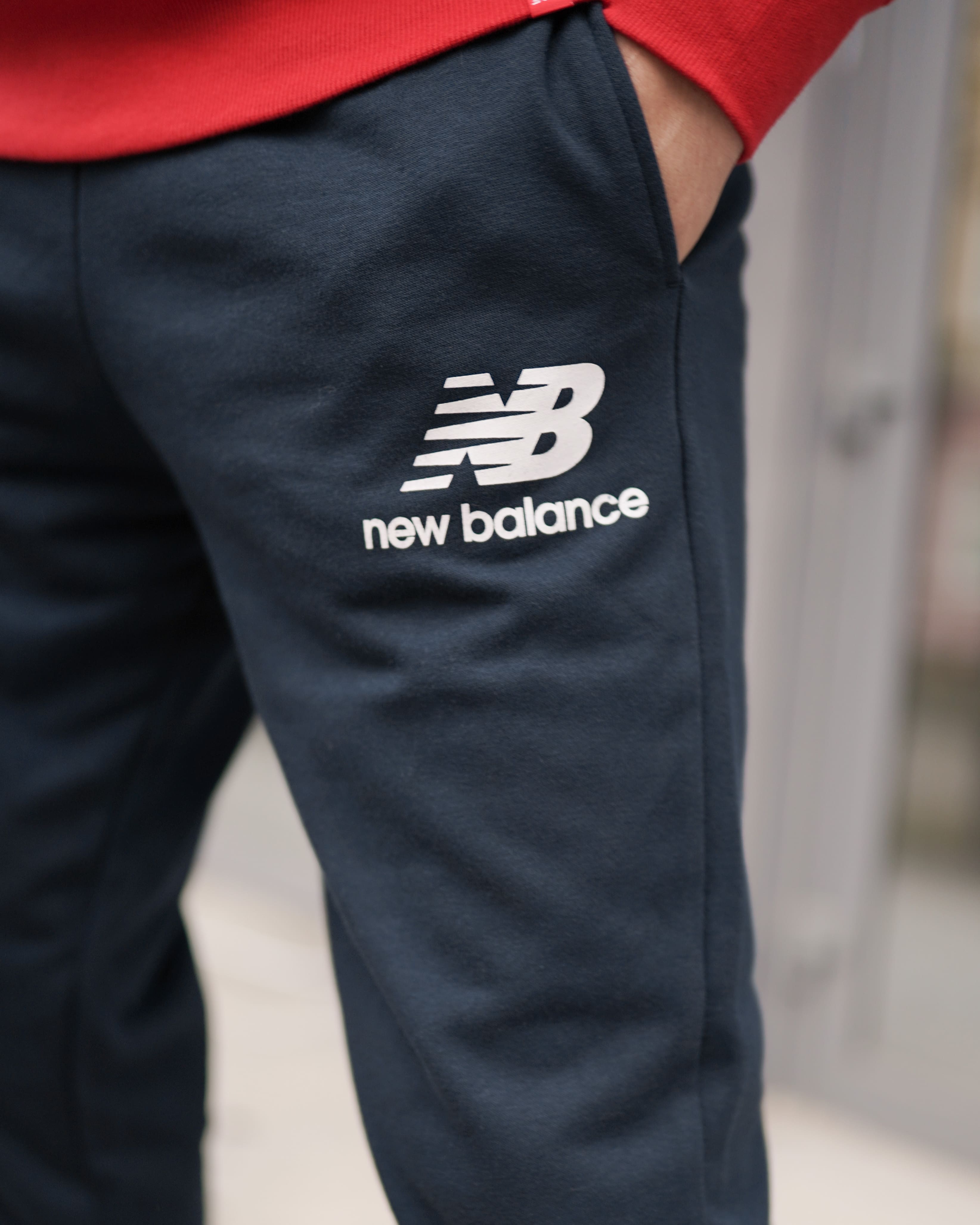 Брюки New Balance NB Ess Stacked Logo Чоловіки р.M