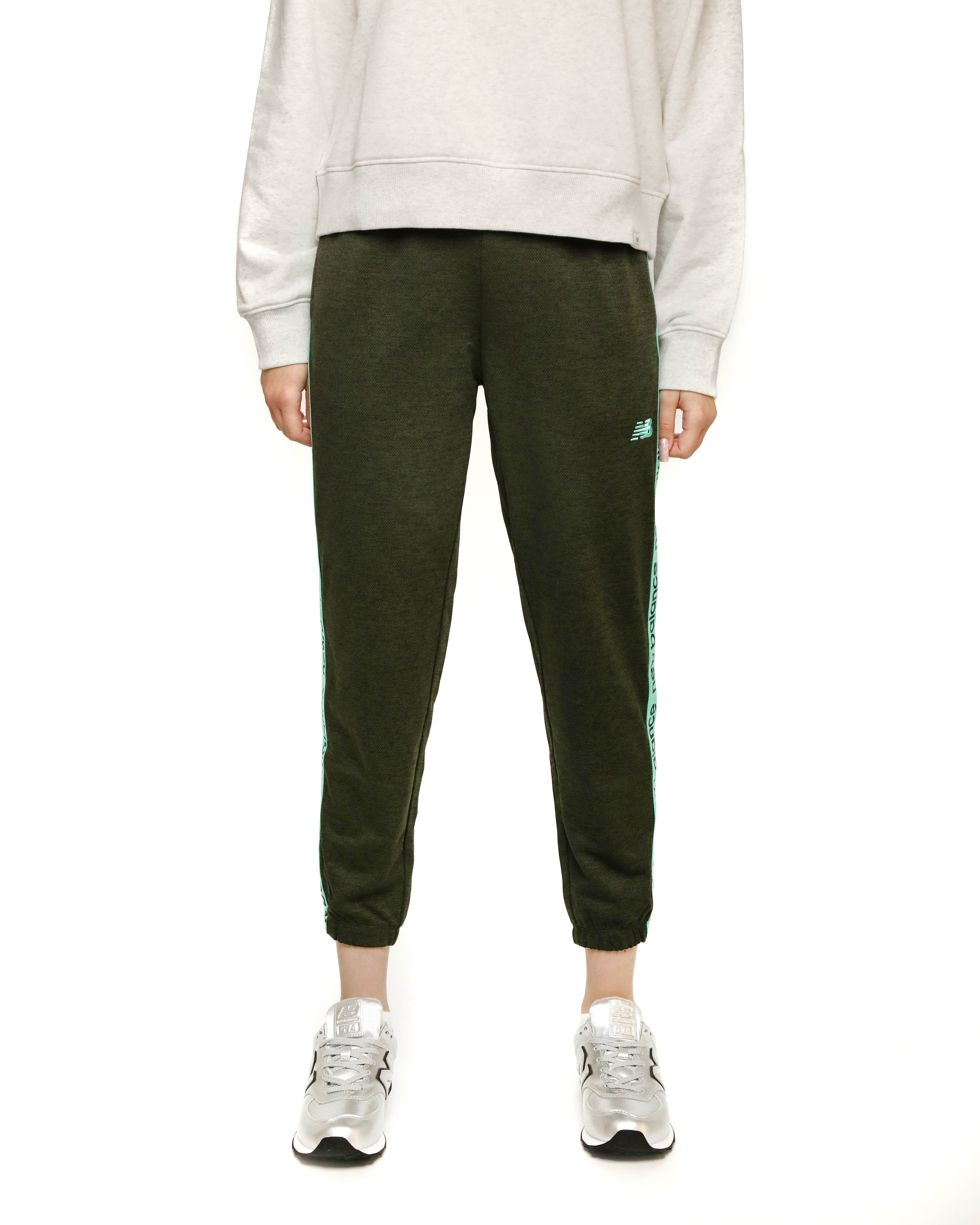 Брюки New Balance Relentless Jogger Жіноча р.XS Зелений/Чорний