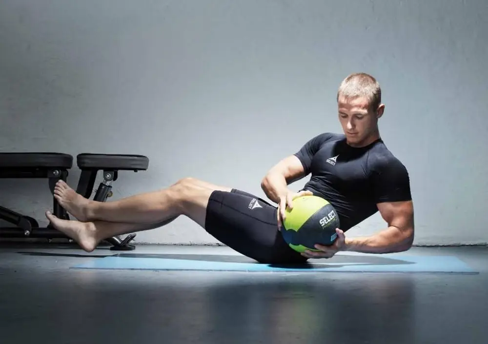 Мяч медицинский SELECT Medicine ball (1 kg)  чорн/салатовий, 1кг фото товара